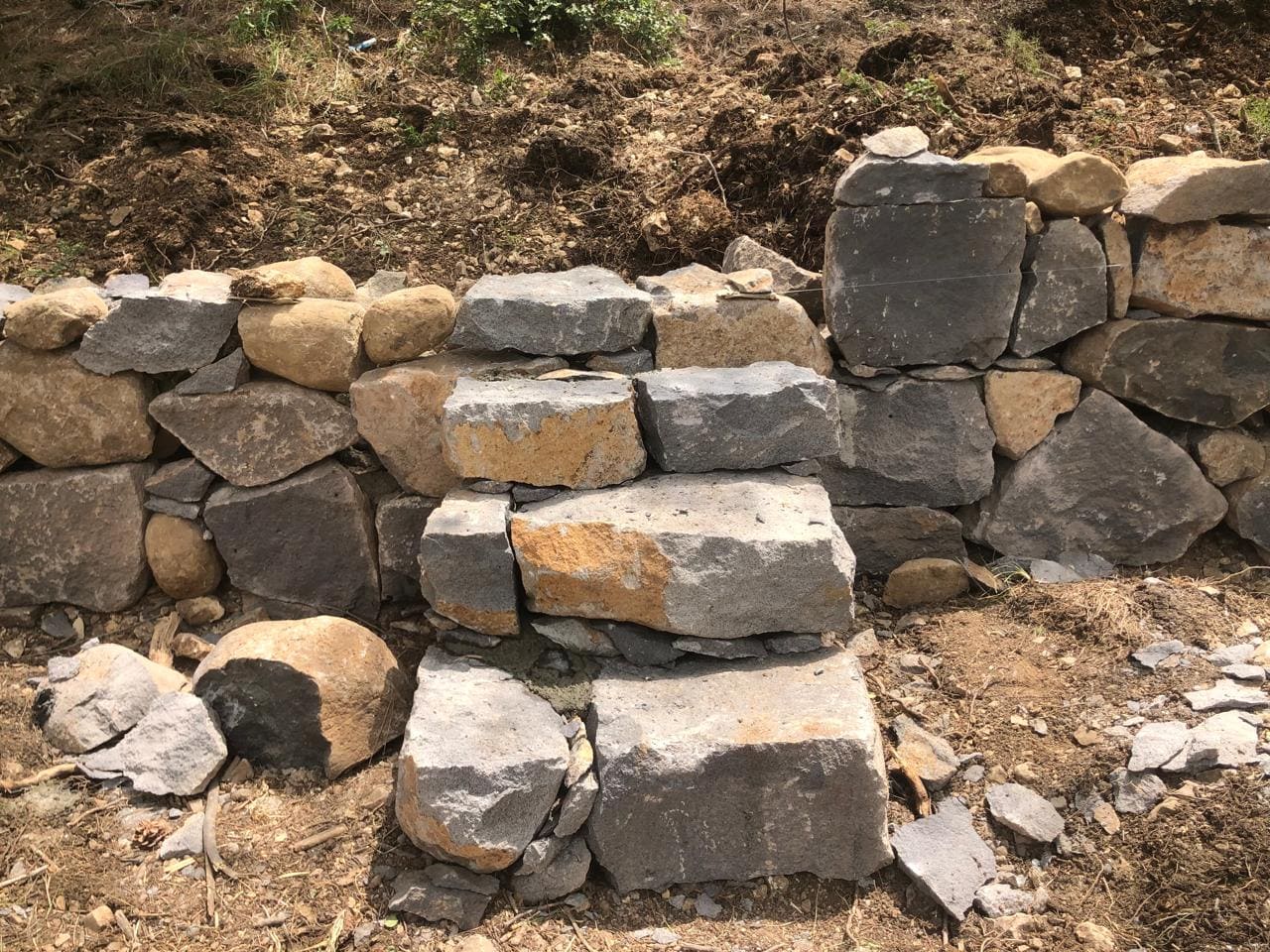 Handcrafted stone steps forming a retaining wall at Horizon Pines, Lebanon