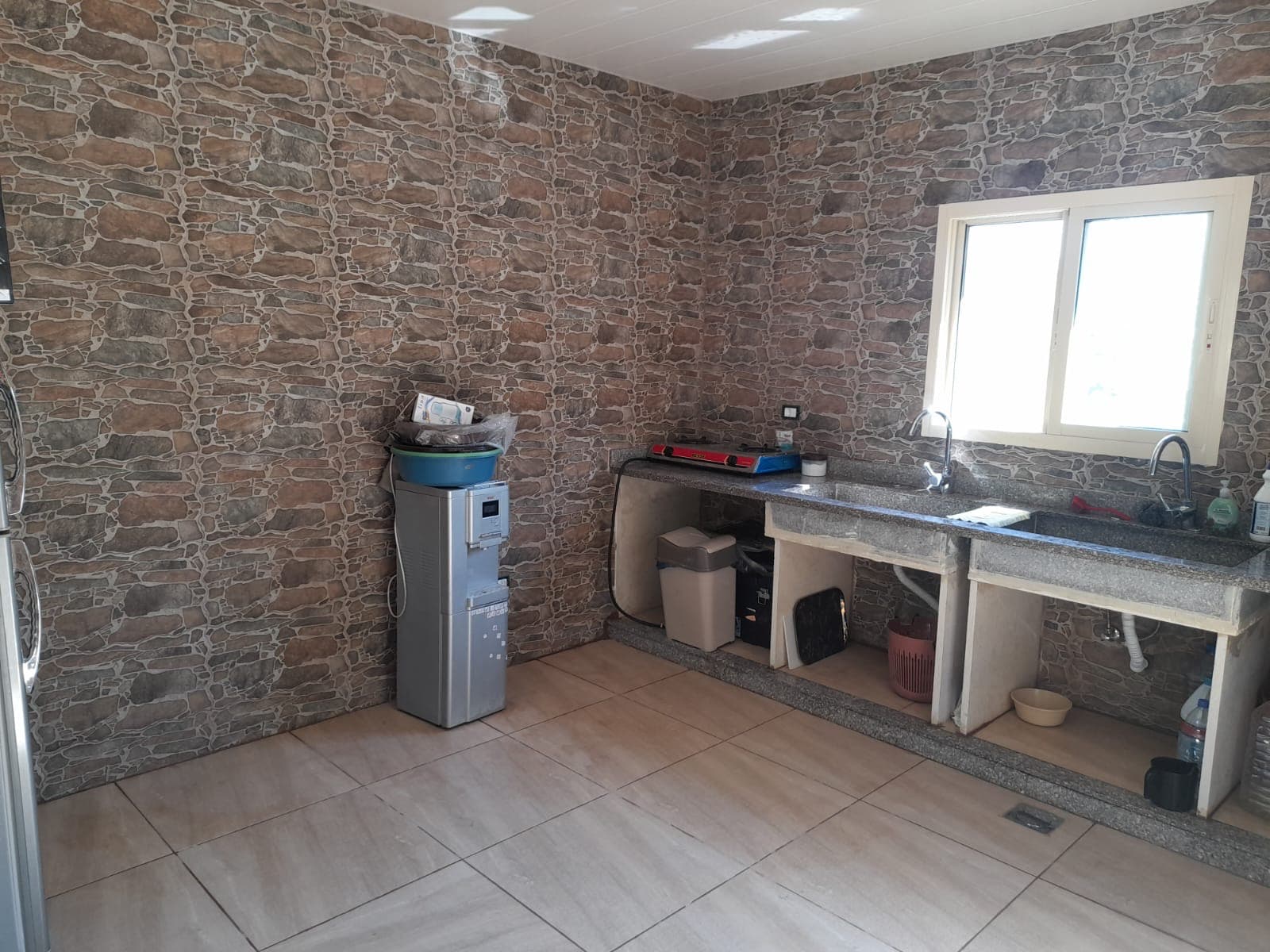 Shared open-air kitchen area for guests at Horizon Pines glamping Lebanon