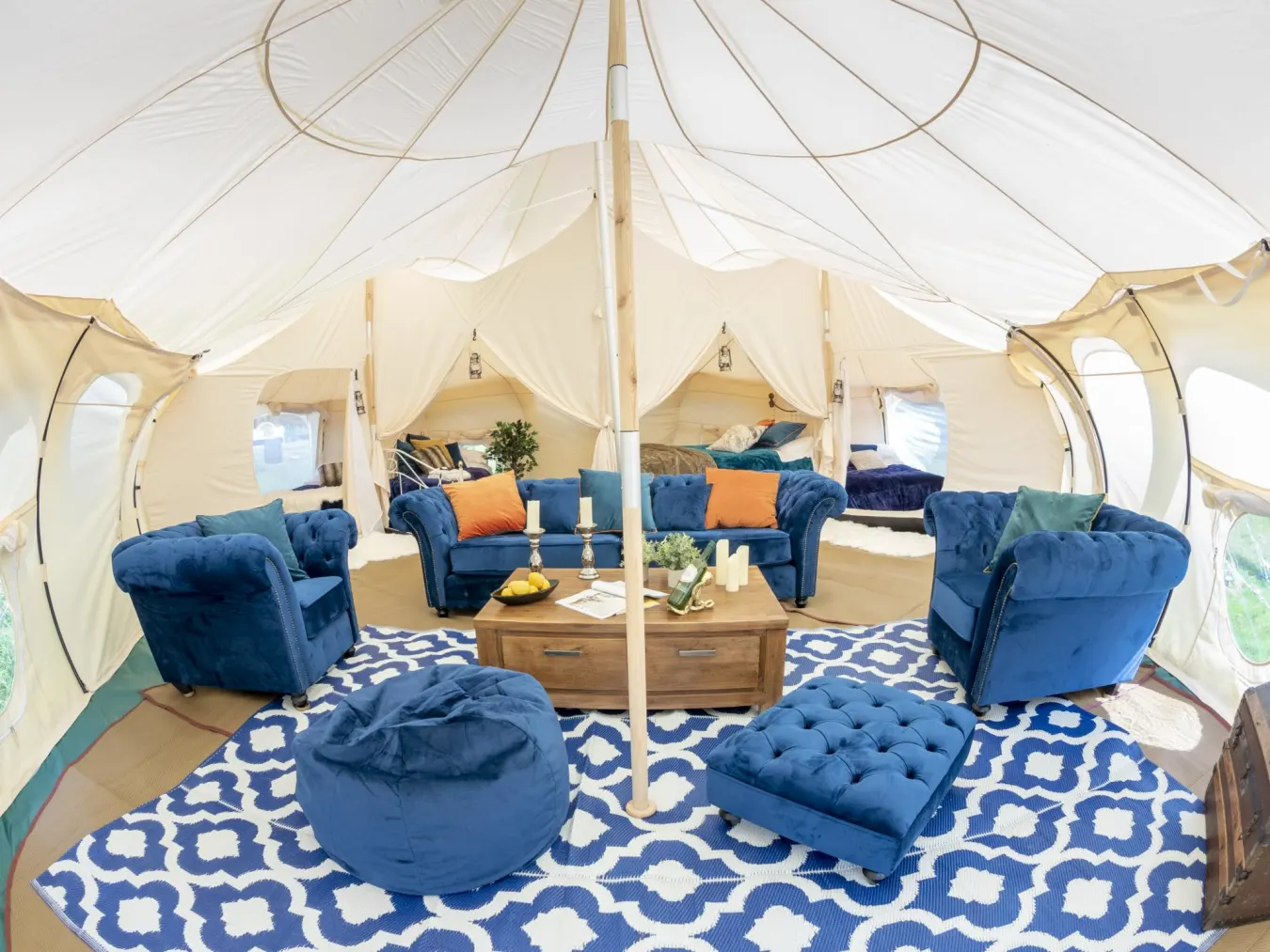 Lotus Belle Stargazer Deluxe Tent illuminated at night under a starry sky at Horizon Pines Lebanon