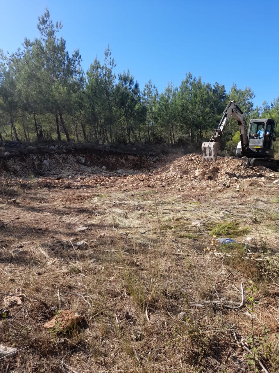 Site excavation and ground preparation during the development of Horizon Pines in Kobayat, Akkar, Lebanon.