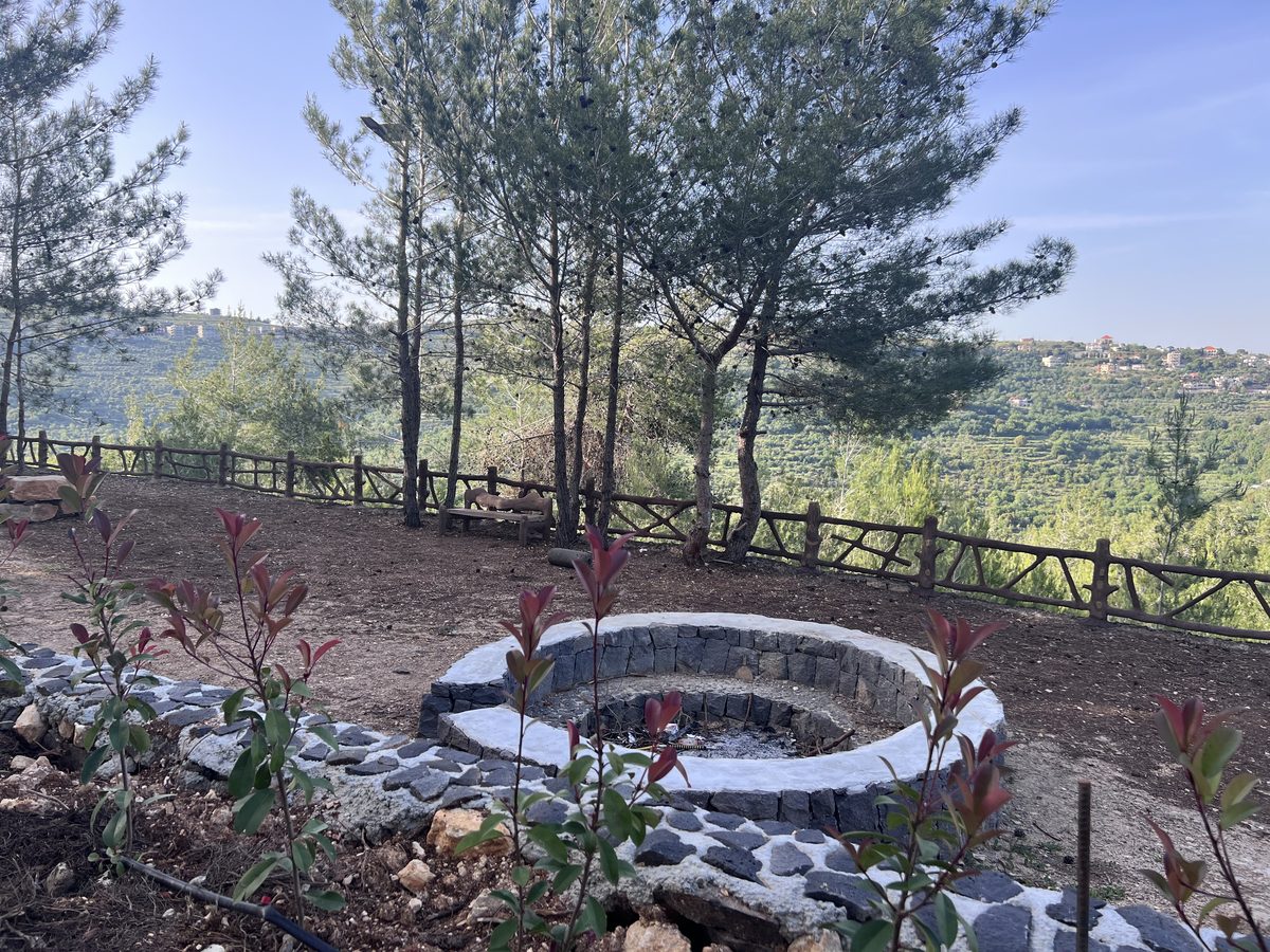 Fire Pit With Landscaped Flowers